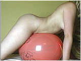 Video clip for sale of Miel getting dirty with a Balloon Directory balloon and a punchball