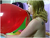 Video clip for sale of Xev inflating a pair of 16-inch balloons by mouth