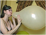 Video clip for sale of Eira struggling to blow to pop a 16-inch balloon