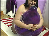 Video clip for sale of Sophie inflating and hug-popping 17-inch balloons
