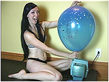 Video clip for sale of Eira inflating Chinese balloons on a pump