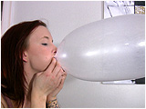 Video clip for sale of Holly inflating and popping condoms
