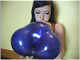 Video clip for sale of Eira inflating and playing with pretty geo blossom balloons