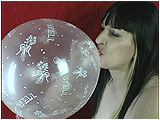 Video clip of Debby slowly inflating clear spray balloons by mouth