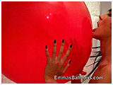 Tulia shows a big red balloon some love