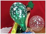 Video clip of Kitty celebrating Christmas with a bag of balloons
