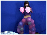 Video clip of Kitty stuffing balloons under her clothes