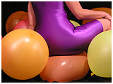 sitting on balloons