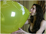 Video clip for sale of Andi blowing to pop 17-inch balloons