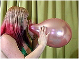 Video clip for sale of Xev blowing to pop small balloons