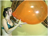 Video clip for sale of blowing to burst a pair of balloons