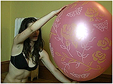 Video clip for sale of Andi blowing to burst Chinese balloons