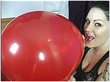 Video clip for sale of Kat blowing to burst a pair of 16-inch balloons