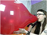 Video clip for sale of Nicky carefully blowing her 17-inch balloon to get the biggest size possible