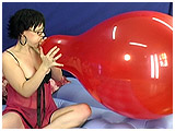 Video clip of Lizzie blowing to burst a 24-inch Qualatex balloon