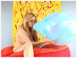 Video clip for sale of Rachel blowing to pop a 16-inch Qualatex spray balloon