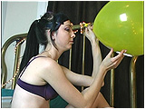 Video clip for sale of Eira smoking a Misty cigarette while inflating a Balloon Directory balloon
