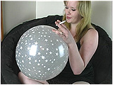 Video clip for sale of Xev smoking while inflating a 16 -inch clear spray