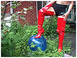 wearing thigh high boots outdoor to foot pop balloons