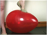 Video clip for sale of Xev footpopping balloons in a pair of ballet-style flats