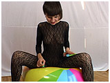 Video clip for sale of Alice pin-popping a 12-panel beachball