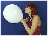 Debby cig-pops her customized smiley-face balloons
