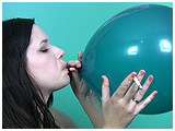 Alexxia inflates a balloon while smoking, then deflates it