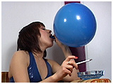 Adele smokes while inflating a balloon