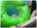 Heather inflates a very unique big swimring by mouth