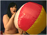 Video clip for sale of Xev inflating a Harajuku beach ball using mouth and pump