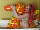 Video clip for sale of Xev in the tub with an inflatable seahorse